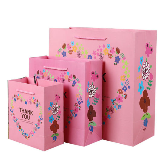 Il regalo bianco del cartone di disegno rosa del cuore di colore ringrazia le vendite al dettaglio del sacchetto